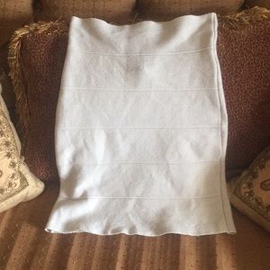 Tight, beige mini skirt